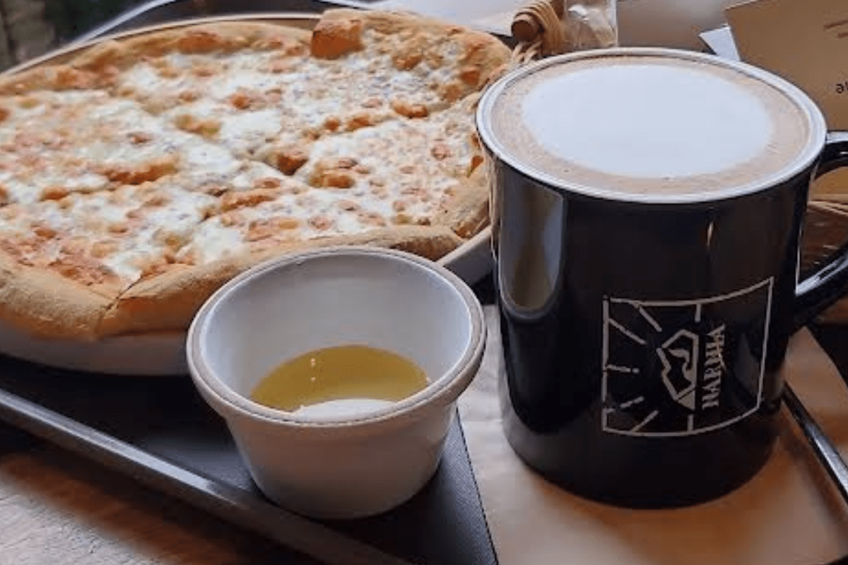 Coffee and pizza from Cafe Narnia