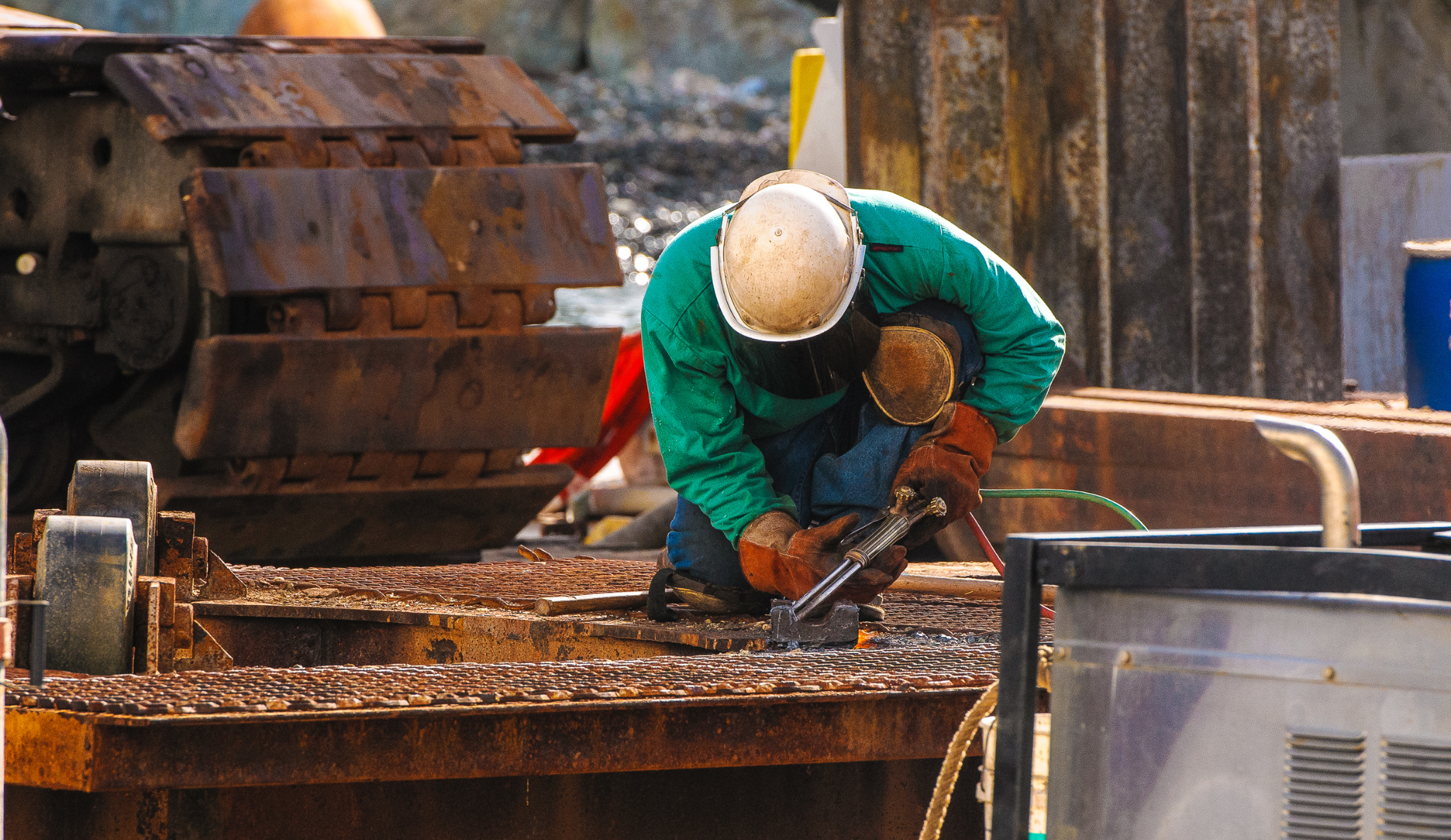 This is a man working on a tall building performing dangerous activity used to represent Korean Labor Day